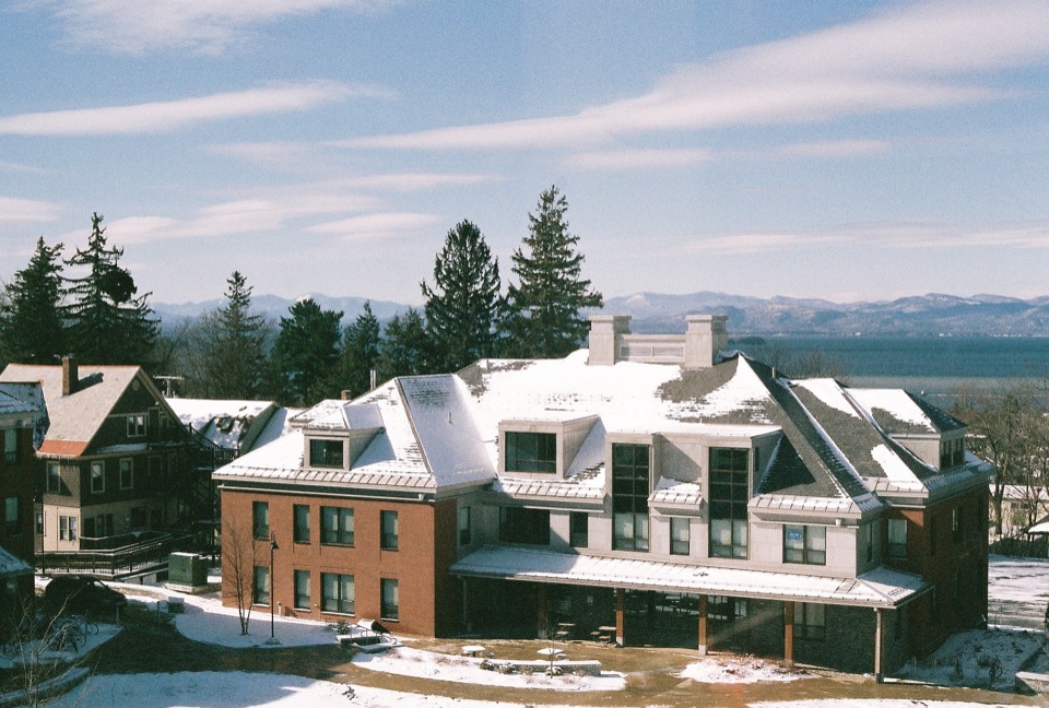 Snow-covered Champlain College buildings overlooking Lake Champlain