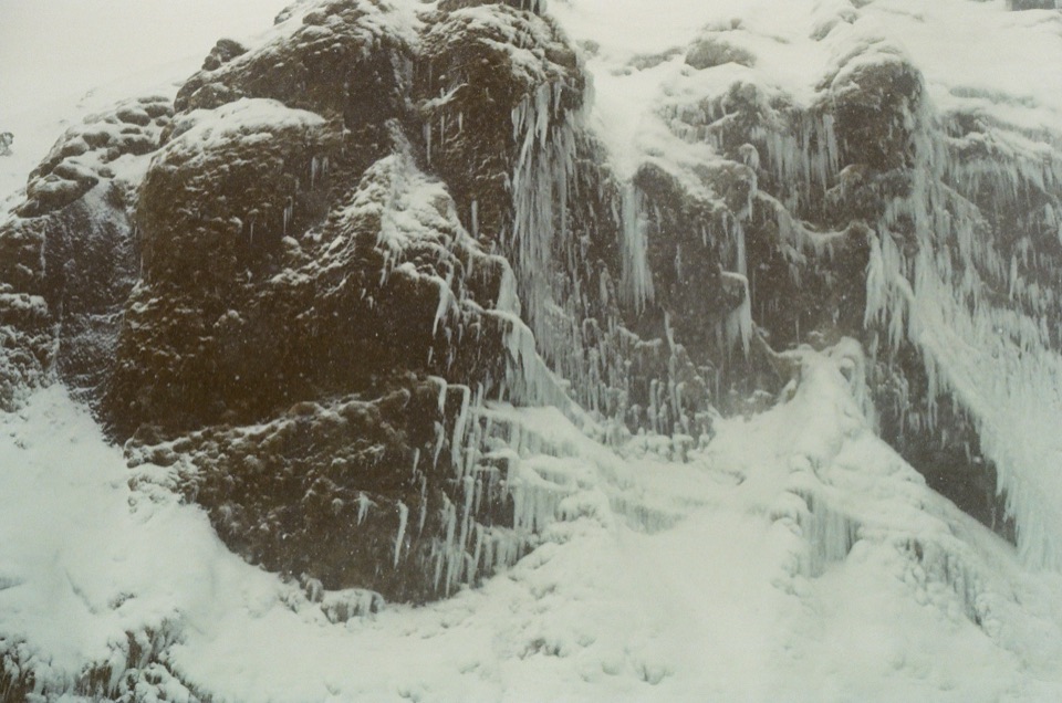 Water and cliffs near Skógafoss